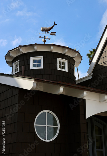 Cape Cod style beach house with tower and weathervane