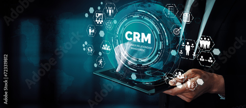 CRM Customer Relationship Management for business sales marketing system concept presented in futuristic graphic interface of service application to support CRM database analysis. uds