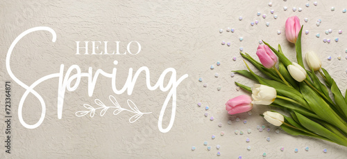 Bouquet of beautiful tulips and text HELLO, SPRING on light background