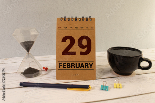 February 29 calendar date text on wooden blocks with customizable space for text or ideas. Copy space and calendar concept