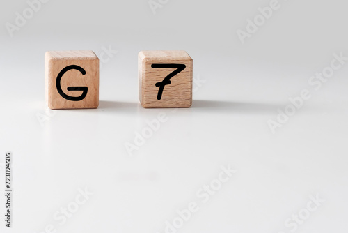 Human hand put wooden block and set technology word G7. Network future. High speed of mobile internet 