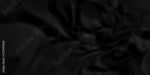 Dark crumple black fabric paper wrinkled poster template ,blank glued creased paper texture background. black paper crumpled backdrop background. used for cardboard and clarkboard.