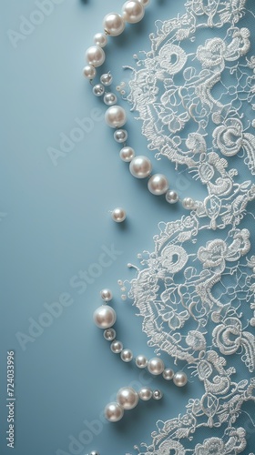 An elegant frame of white lace and pearls on a soft blue background, creating a sophisticated space for text. Vertical orientation. 
