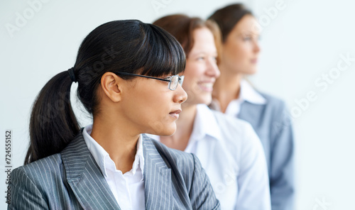 Thinking, business people or group in row, planning future or strategy isolated in studio on a white background. Vision, team or professional in line, profile or leadership of lawyer in collaboration