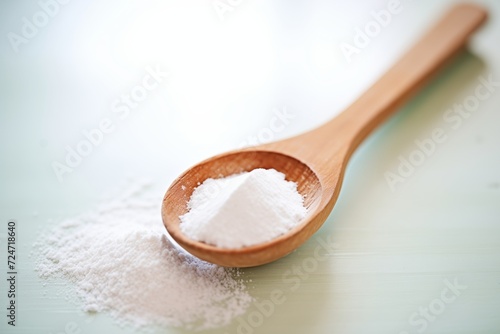 a powder form of stevia in a wooden spoon