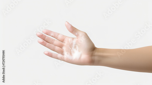 Hand sanitizer spray being used by female hands isolated on a white background
