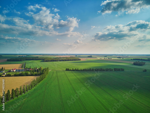 Aerial drone view of green fields and meadows in Yveliness,, near Paris, France