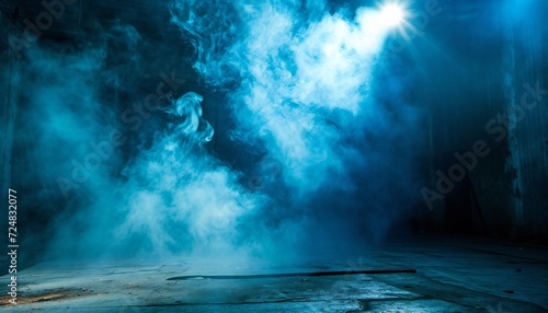 Empty scene with a blue spotlight and smoke.