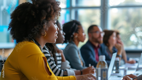 Inclusive and diverse people having a discussion in a work meeting. AI generated 