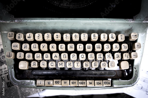 Antique typewriter cyrillic keys close up and russian keys selective focus