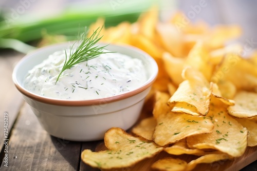 crinklecut potato chips with ranch dip, closeup
