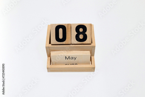 8th of May wooden perpetual calendar. Shot close up isolated on a white background