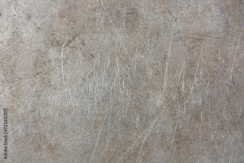 abstract of old dirty scratched metal surface background, weathered grey textured aluminum or silver, rustic wallpaper or backdrop for graphic design