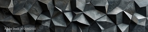 Modern 3D wall of dark, geometrically cut stones, arranged in a visually striking pattern, combining tradition with contemporary aesthetics