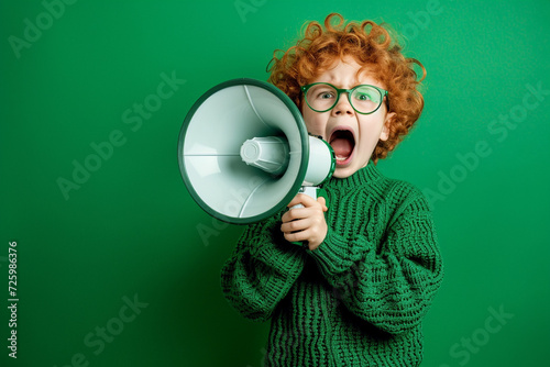 Excited ginger kid shouting through a loudspeaker on green background. Generative AI.