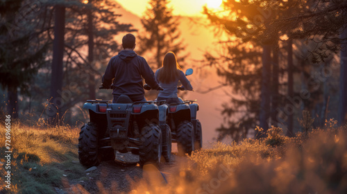 Young couple on a off road adventure excursion outside. Off-road quad bike