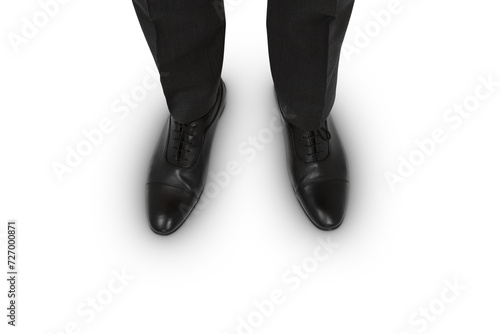 Top view of businessman's black shoes on white surface, corporate attire