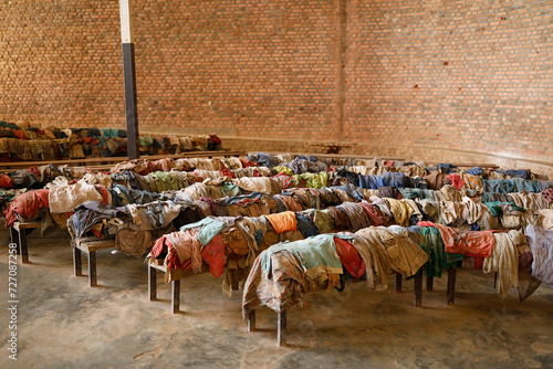 Nyamata Genocide Memorial Center, Nyamata, Rwanda. Victims' clothes on church pews