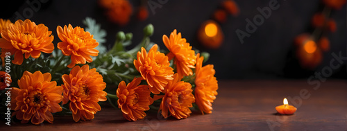Funeral saffron chrysanthemum with copy space. Warm saffron chrysanthemum on a deep orange background with space for text.
