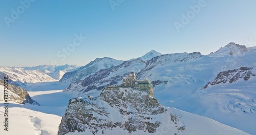 Panoramic landscape of Sphinx observatory and Aletsch glacier on Jungfraujoch Swiss Alps, Switzerland. Jungfrau top of europe in interlaken one of the highest mountain in the world on winter sunny day