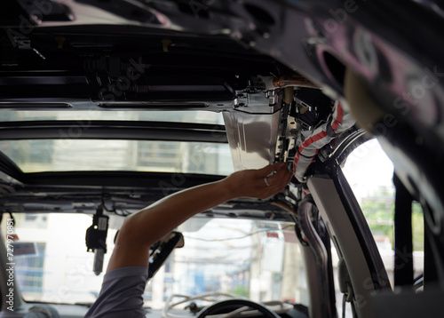 close up of a car with sun roof repairing