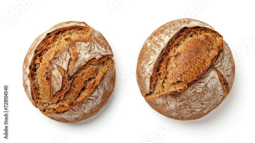 Freshly baked round Bread isolated on white background. Sliced, cutted wheat bread. Bakery, rustic traditional food concept. Top view