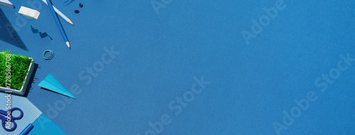 School supplies on a blue background. Top view. 