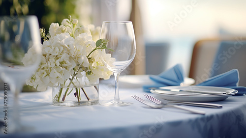 table setting in the restaurant interior light blue tones mediterranean style