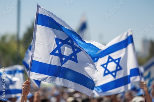 A diverse group of individuals holding Israeli and Israeli flags with pride and unity.