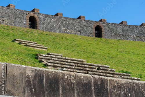 Wall ans seats of amphitheater, or coliseum of the archaeological park of Pompeii-Naples-Italy