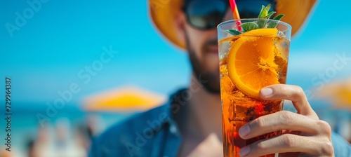 Savoring long island iced tea on paradise beach, embracing sunny summer day, with ample text space.