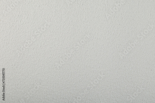 Texture of Sodium percarbonate or sodium carbonate peroxide, close-up. White granulated powder. Chemical substance with formula Na2H3CO6 used in eco-friendly bleaches and other cleaning products