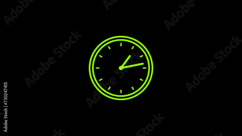 Green clock icon. Time symbol isolated on black background.