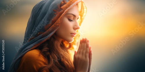 woman with head covered in scarf praying to God , Christianity and religion background, faith and redemtion banner
