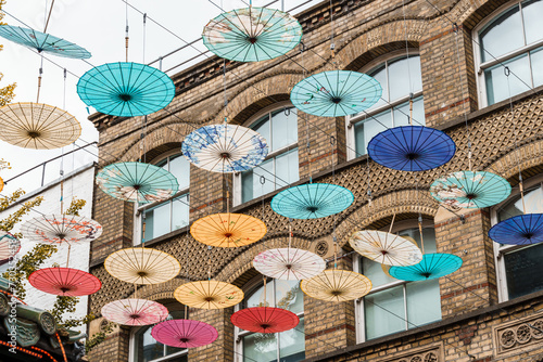Umbrellas hanging over street in Chinatown in London