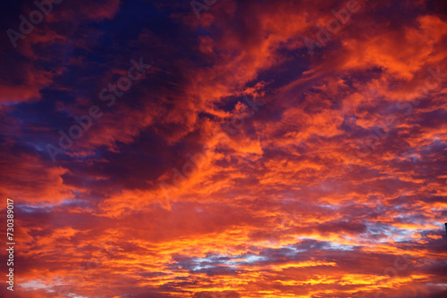 orange purple dramatic stormy sky before storm at sunset for color sky background