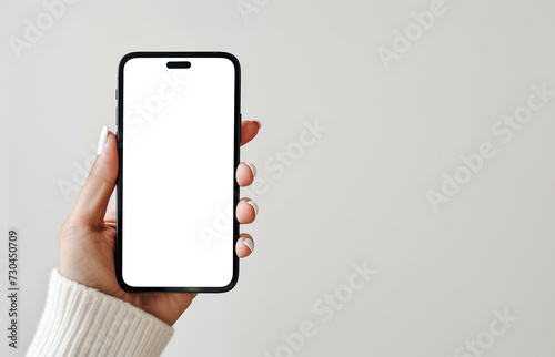 hand with great color nail design holds big phone with white screen iphone 13 flat view white background for website. transparent bakcground. PNG