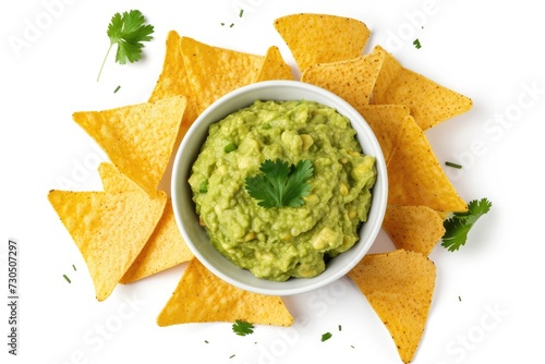 Guacamole dip with tortilla chips in white bowl Isolated on white background Top view