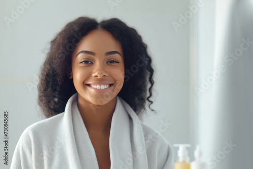 Smiling black woman with makeup