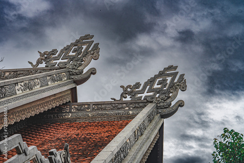 Asian pagoda roof in storming afternoon