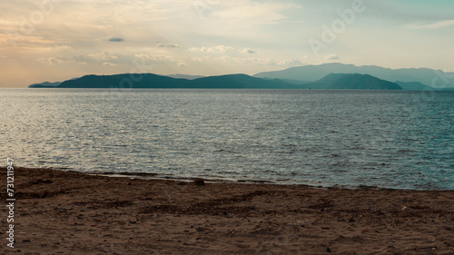 Landscape of Greek island samos from a beach in Turkey.