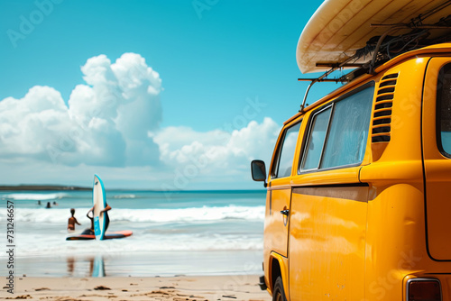 A yellow van with a surf board at the beach