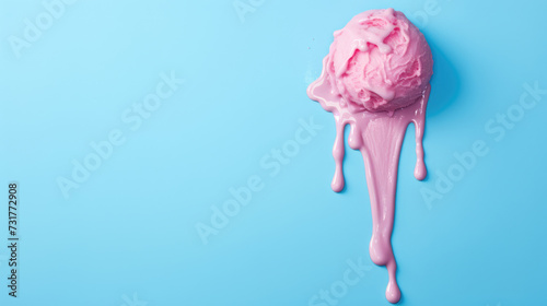 Pink ice cream melting on pastel blue background. Summer concept.