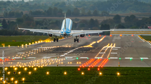 landing at the airport, landing on a runway, plane lands on a runway