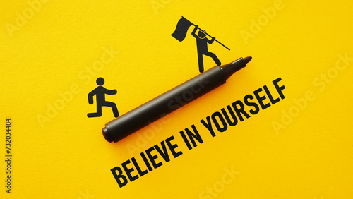 Believe in yourself is shown using the text and picture of running man