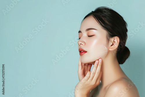 Skincare Model bb cream. Well groomed woman uses nighttime, foam structure lip balm, lotion & eye patch. Face cream hand soak jar wrinkle cream pot
