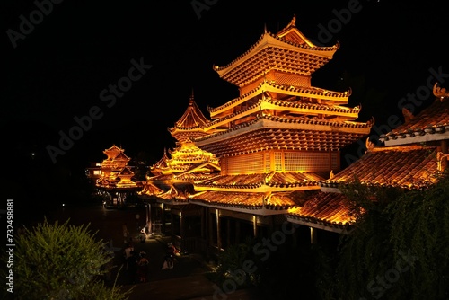 Illuminated Zhaoxing Dong Minority Village Pagoda in Shaoxing, China at night