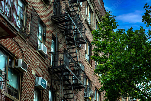 Typical red brick houses and emergency stairs of the orthodox Jewish neighborhood of Williamsburg, in Brooklyn where there is a large Jewish community in New York City (USA).