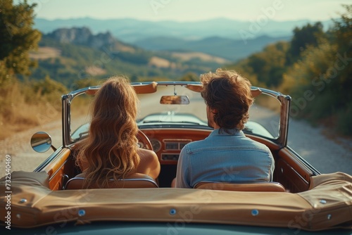 Man and Woman in Convertible Car