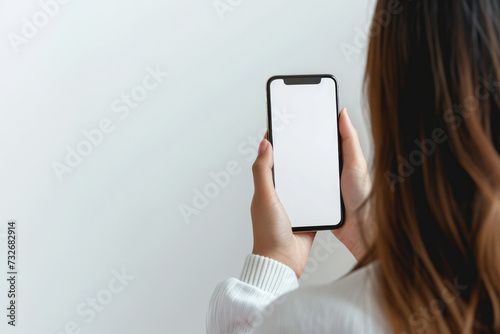 A close up of a hand holding smart phone , smart phone screen is blank , Mockup blank template illustration
